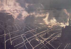 Where there is coal there is also steel and steam to move engines. China, 1983.